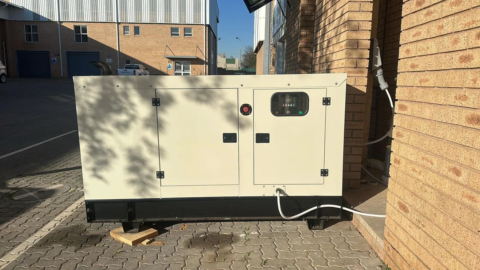 Large commercial standby generator with the canopy closed