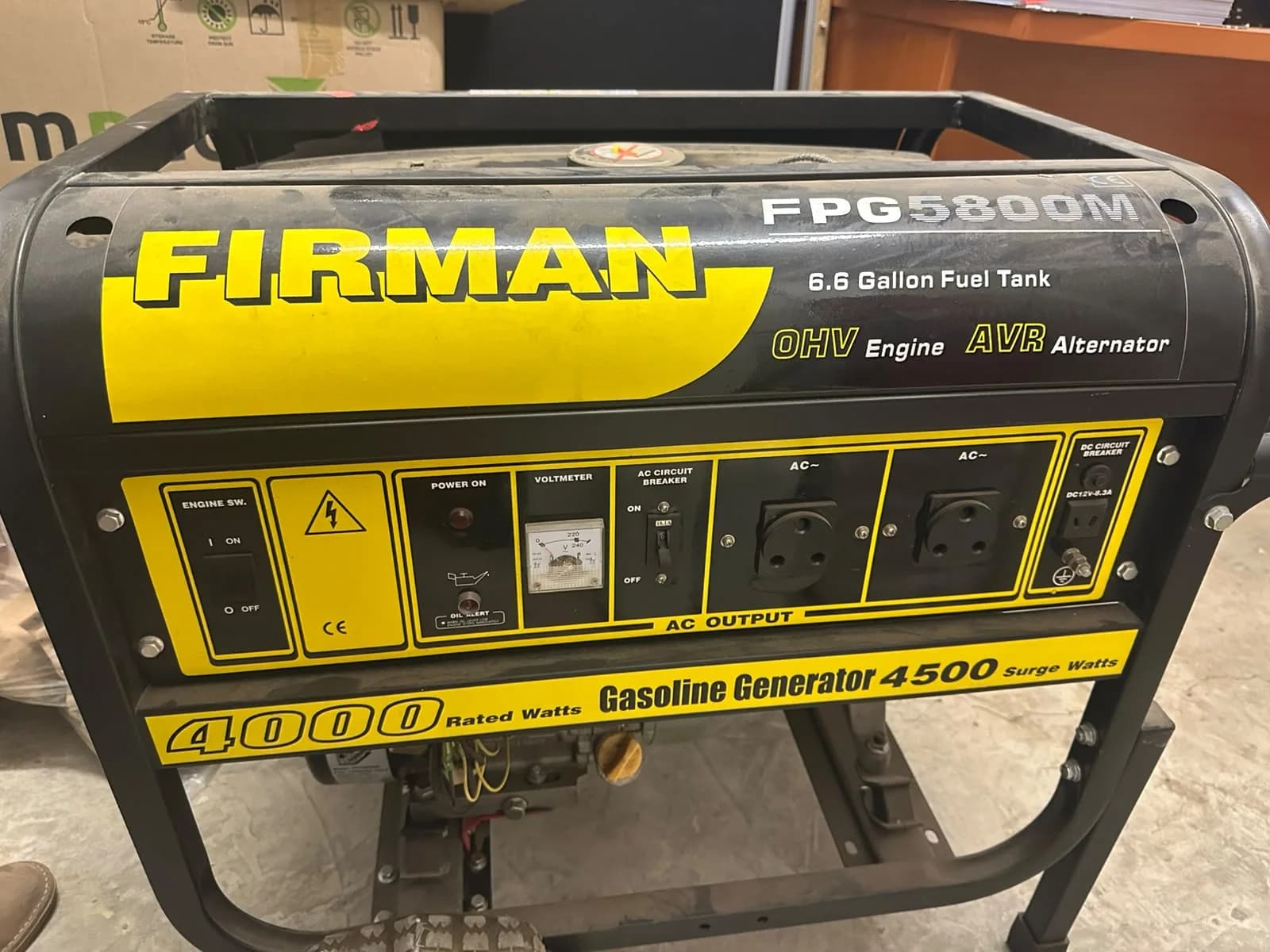 Firman FPG5800M petrol generator rated 4000 W, showing its control panel, voltmeter and two AC sockets