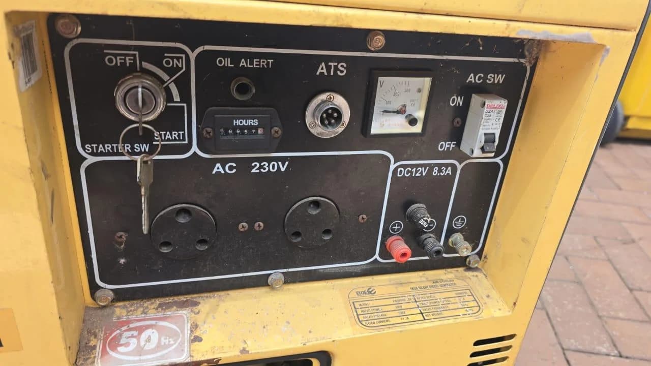 Yellow silent diesel generator panel with key starter, hour meter, voltmeter, ATS socket and two 230 V outlets